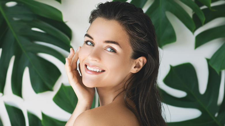 Girl smiling with plants