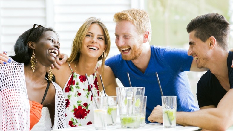friends laughing double date attraction