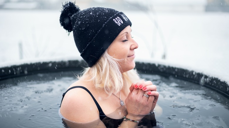 Woman taking an ice bath