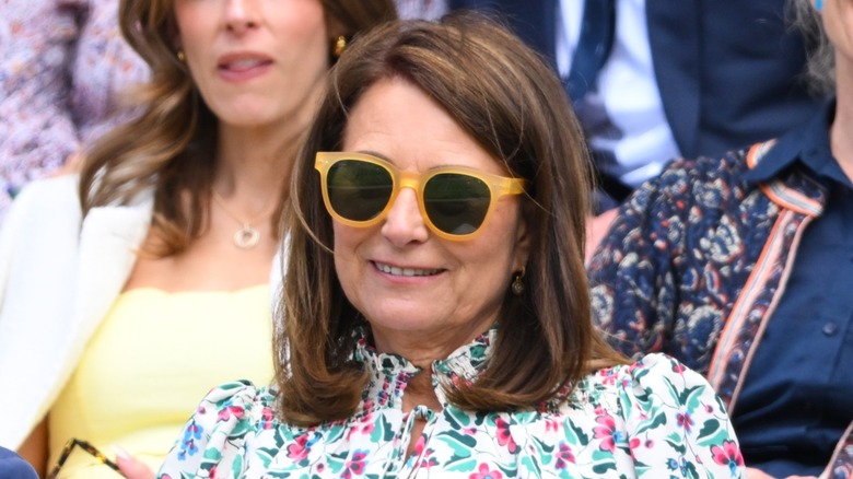 Carole Middleton smiling in sunglasses