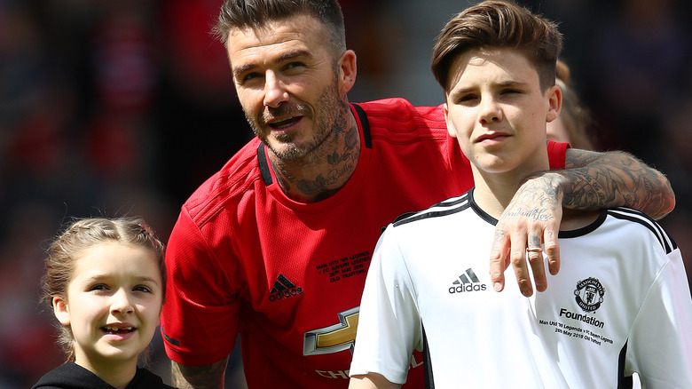 David Beckham with two of his children