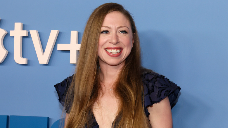 Chelsea Clinton smiling at premiere of AppleTV+ show