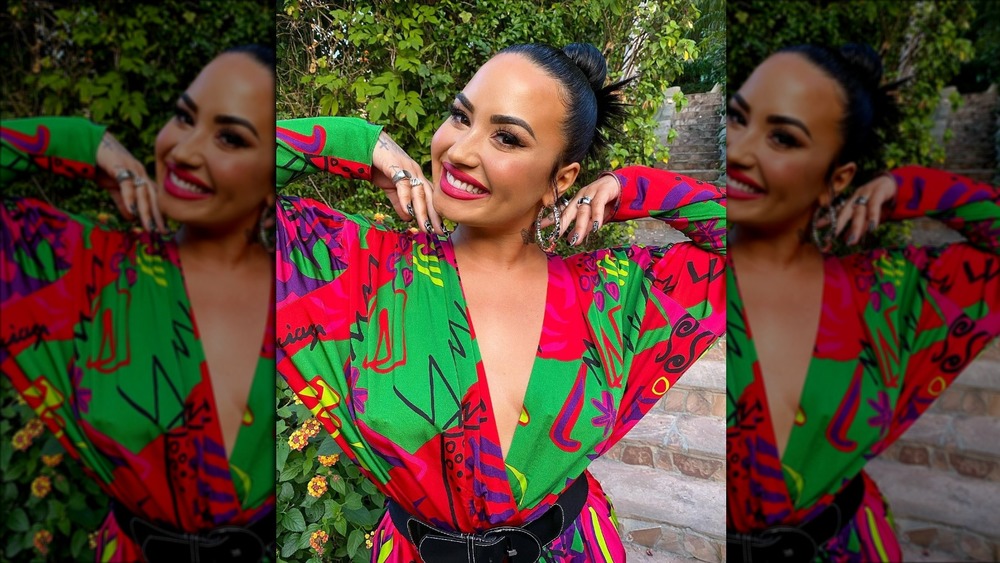 Demi Lovato all glammed up in a colorful dress