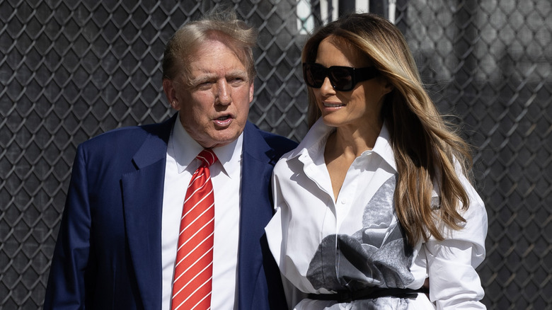 Donald and Melania Trump walking together