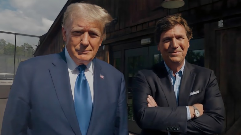 Tucker Carlson and Donald Trump smiling at the camera