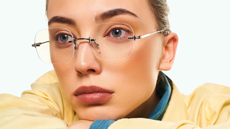 Woman wearing frameless glasses