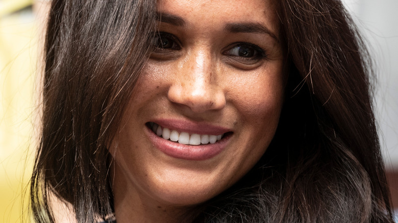 Meghan Markle poses with smile