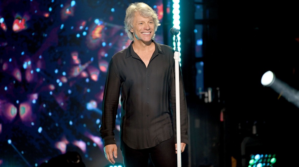 Bon Jovi smiling on stage 