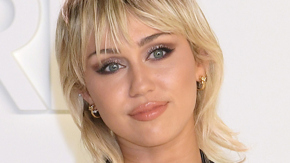 Miley Cyrus with glitter eyelashes