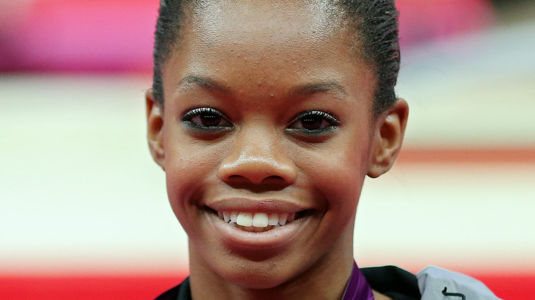 Gabby Douglas smiling at Olympics