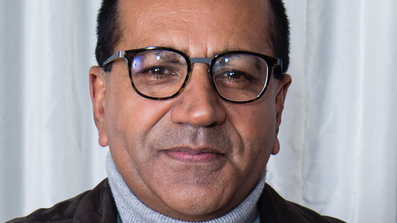 Journalist Martin Bashir in glasses and turtleneck