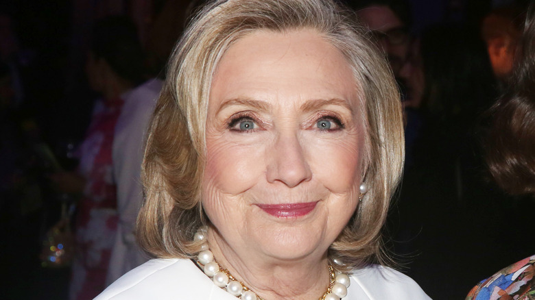 Hillary Clinton white jacket white beaded necklace