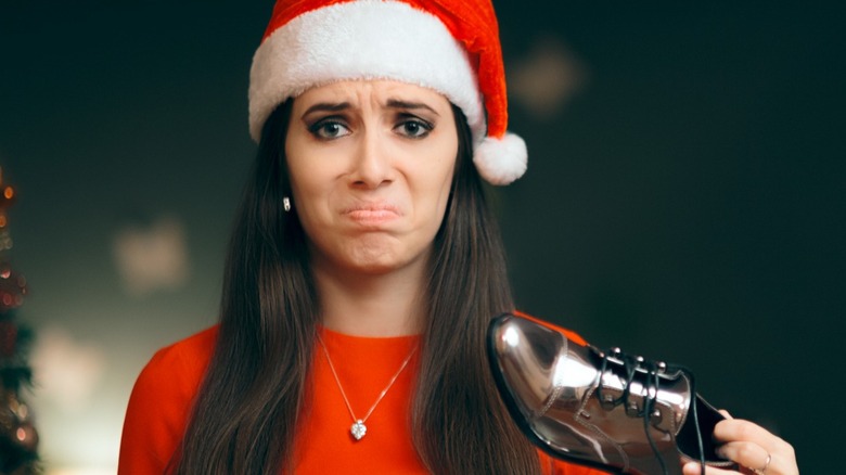 young woman hates holiday gift
