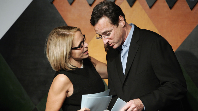 Bob Saget and Katie Couric standing together