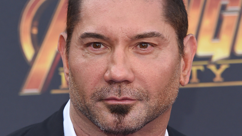 Dave Bautista poses on the red carpet
