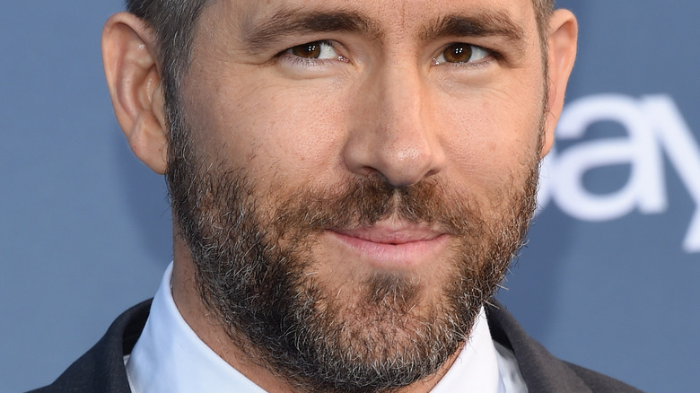 closeup of Ryan Reynolds' face 