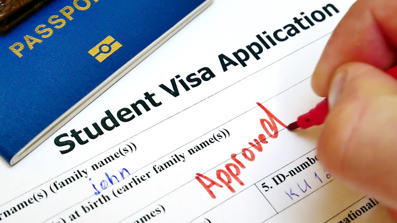 Student filling visa application