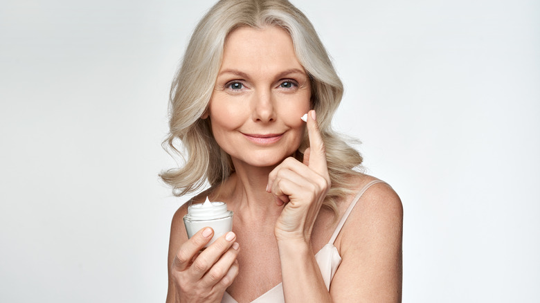 mature woman with an antiaging skin care routine