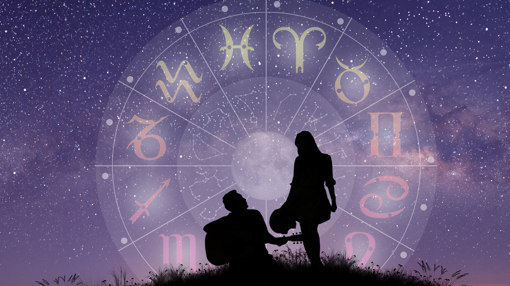 Couple under an astrology chart