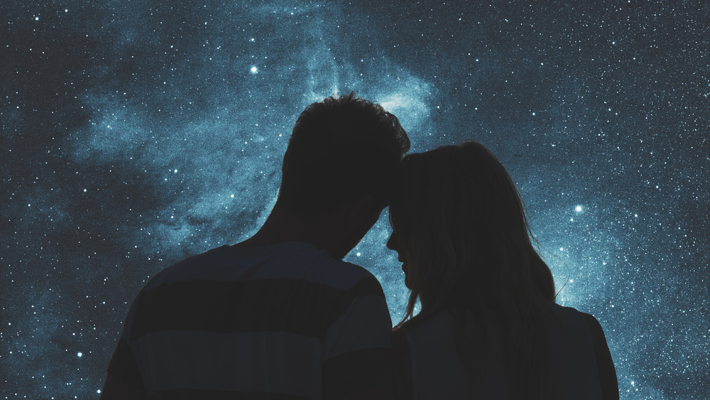 Couple looking at stars