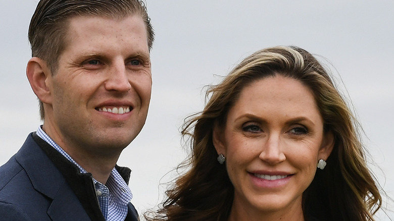 Eric and Lara Trump smiling for a photo