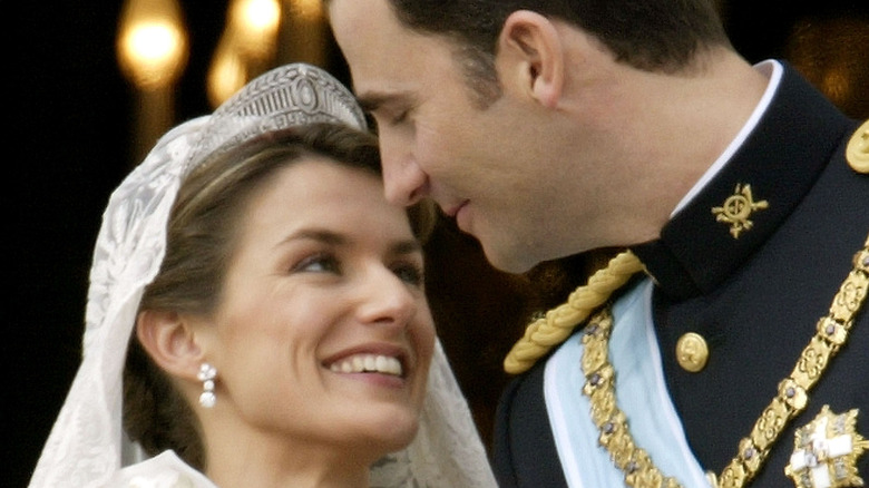 Princess Letizia smiles at Prince Felipe at wedding