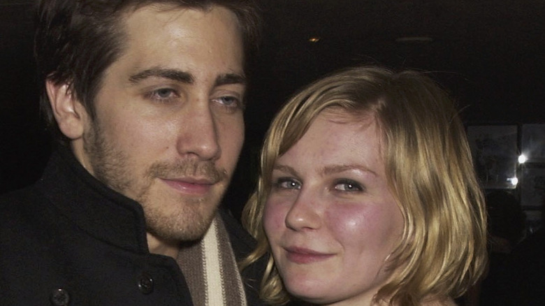 Jake Gyllenhaal and Kirsten Dunst attend a premiere party in 2003