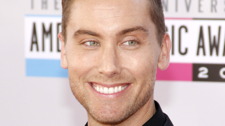 Lance Bass smiling at an event in L.A.