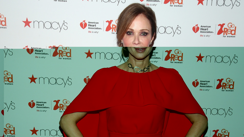 Former NCIS star Lauren Holly poses on the red carpet