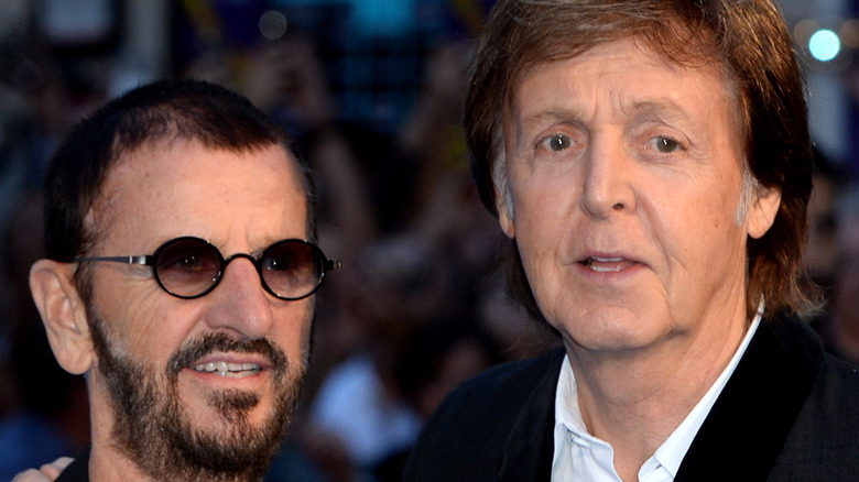 Ringo Starr and Paul McCartney pose for photographers