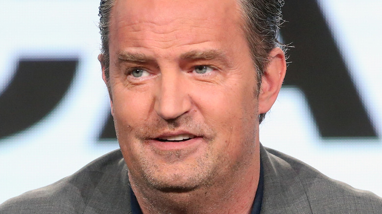 Matthew Perry at a press event 