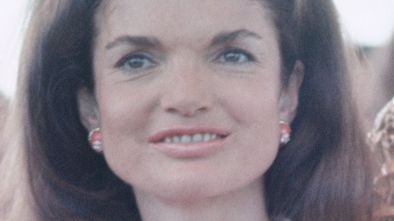 Jacqueline Kennedy Onassis smiling