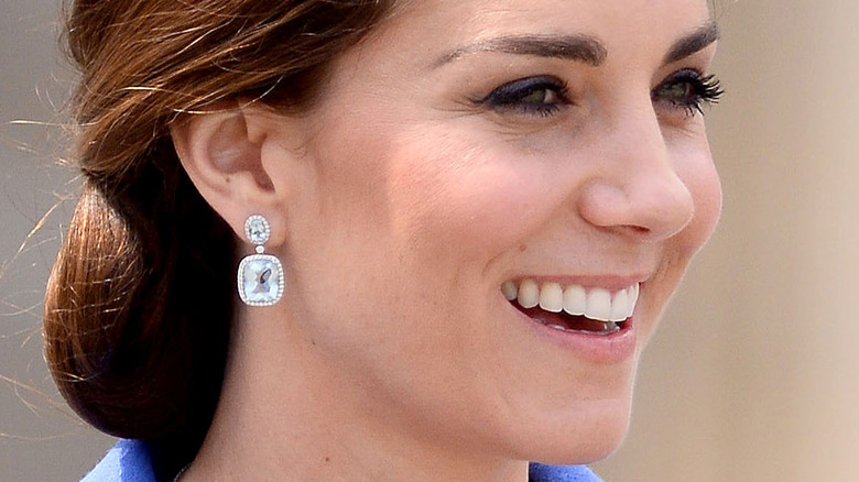 Kate Middleton smiling in side profile