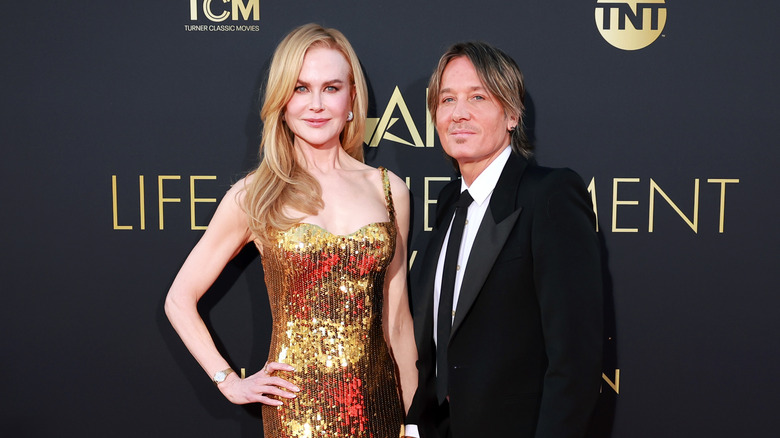 Nicole Kidman and Keith Urban posing on the red carpet together