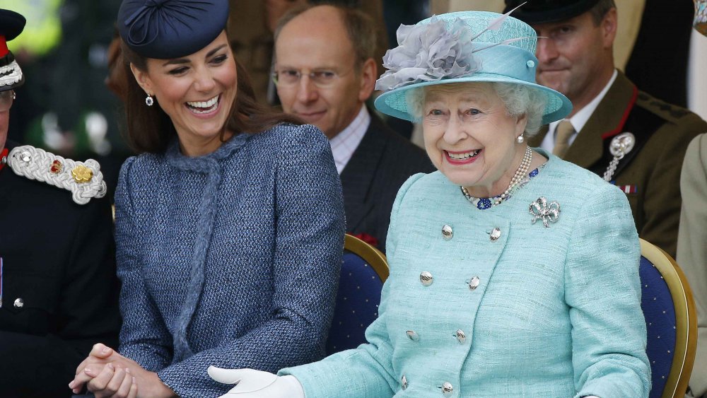 Kate Middleton laughing with Queen Elizabeth