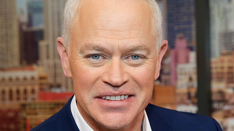 Neal McDonough smiling for photo