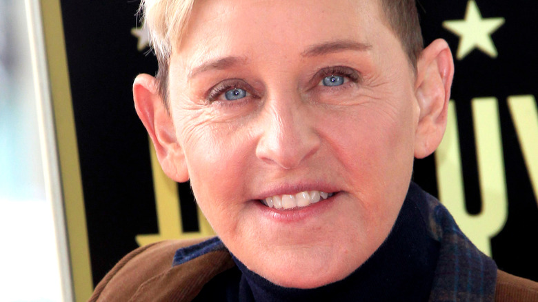 Ellen DeGeneres posing at event