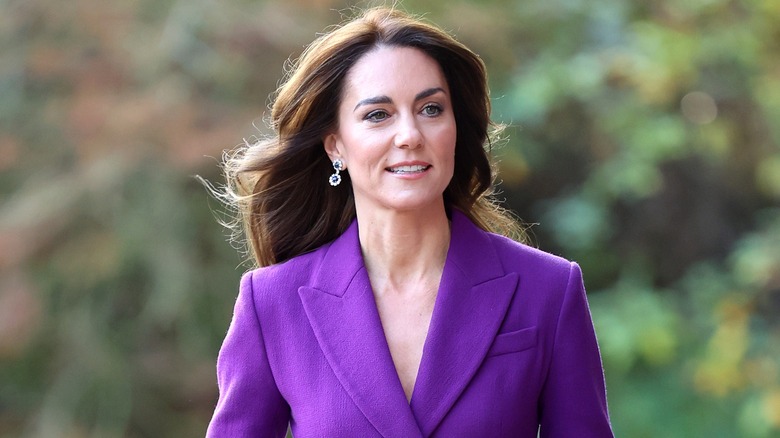 Kate Middleton wearing a purple suit
