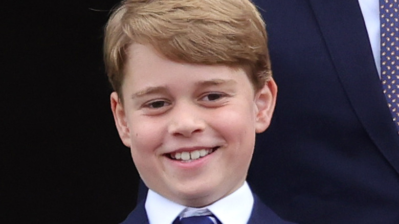 Prince George smiling at Jubilee Pageant