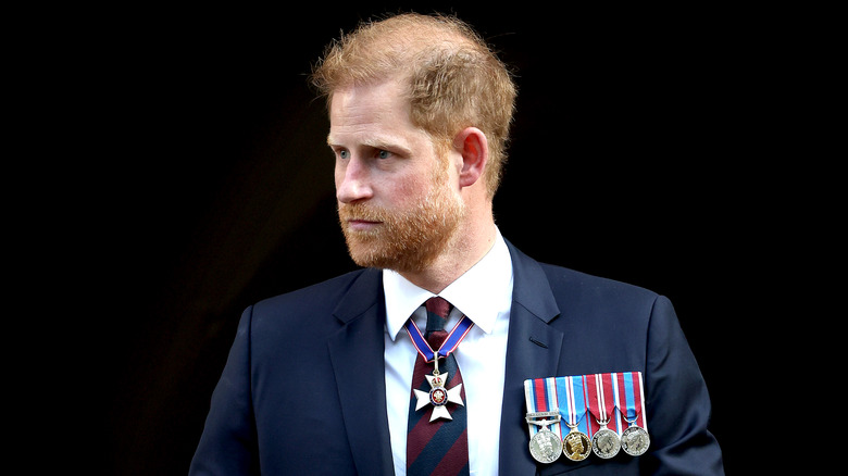 Prince Harry frowning