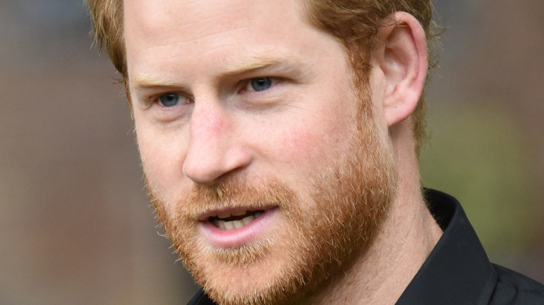 Prince Harry pictured in a dark shirt
