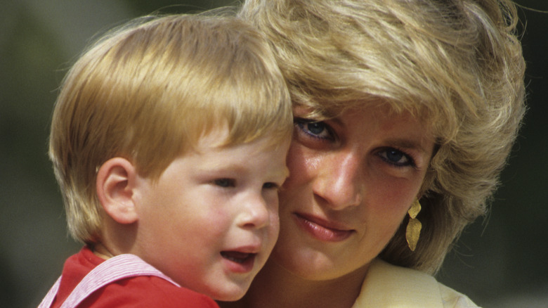 Prince Harry and Princess Diana hugging