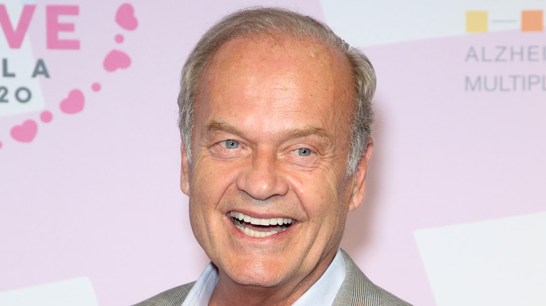 Kelsey Grammer smiling and laughing