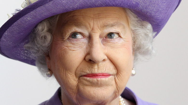 Queen Elizabeth dressed in lavender 