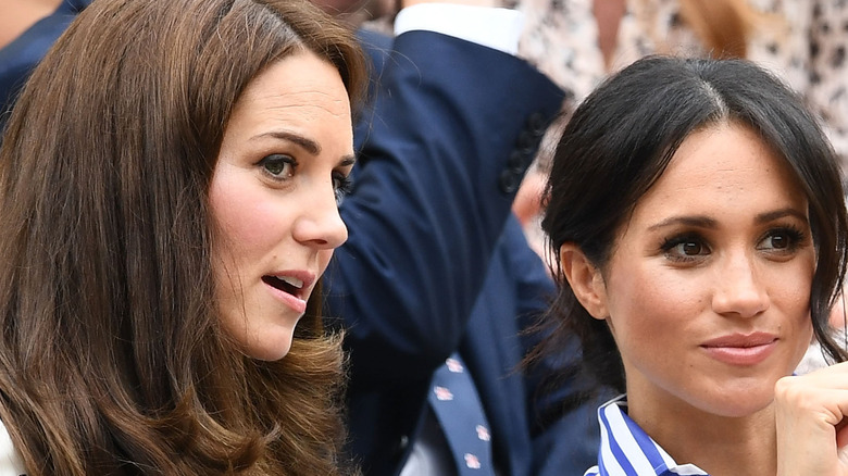 Kate Middleton and Meghan Markle at an event.