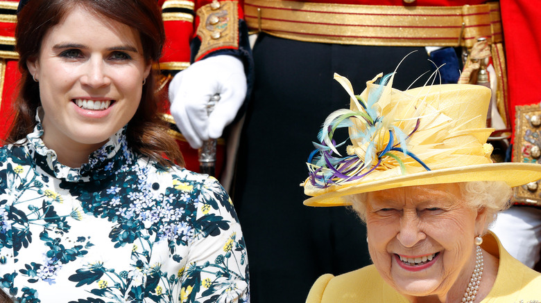 Queen Elizabeth smiling with Princess Eugenie