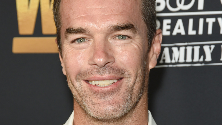 Ryan Sutter smiling with facial hair
