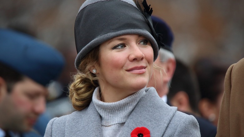 Sophie Trudeau wearing a hat and looking off to the side