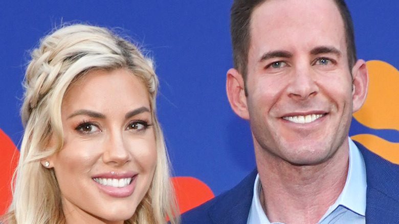 Tarek El Moussa and Heather Rae Young pose together