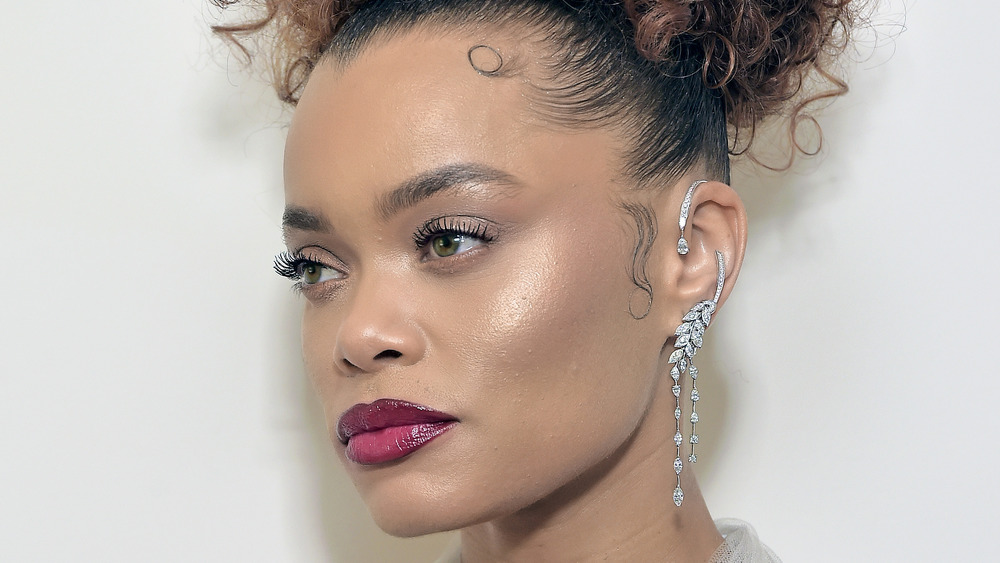Andra Day with a curly updo